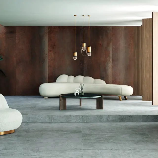 Oxidised-metal effect porcelain wall in a lounge